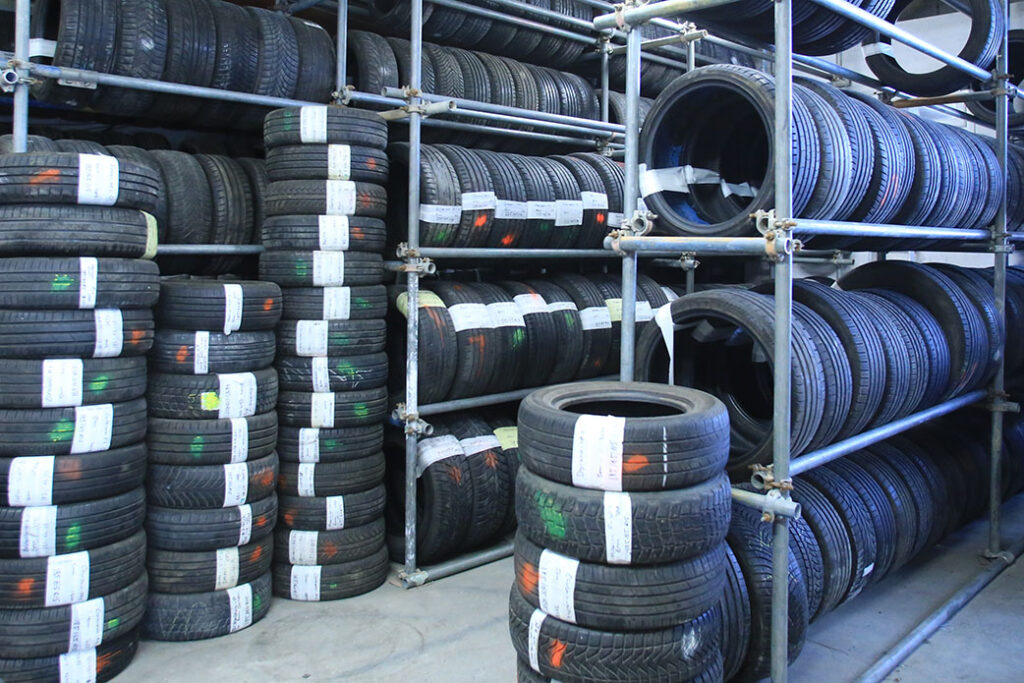 Stacks of new and part worn tyres at Platinum Tyres in Doncaster